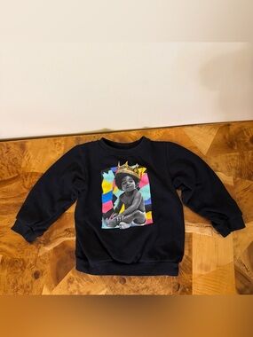 Merch Traffic Black Kids Sweatshirt with Colorful Crown Graphic